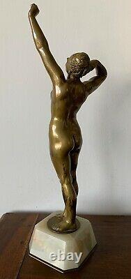 Le réveil, Sculpture en bronze sur un socle en onyx Art Déco
