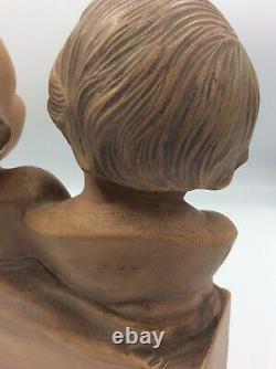Sculpture bustes Trois enfants rieurs en terre cuite signé R. Pollin Art Déco