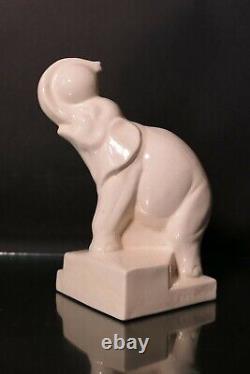 Sculpture céramique art déco éléphant avec ballon signé Duquenne