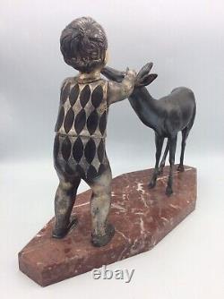 Sculpture enfant et biche en régule patiné sur socle en marbre Art Déco