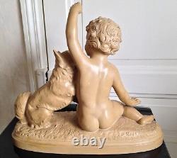 Sculpture enfant et son chien terre cuite patinée signée B Rez, à identifier