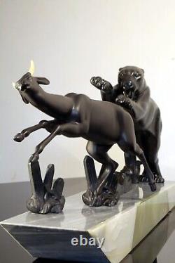 Statue art déco panthère chassant une gazelle